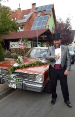 Hochzeit Bräutigam im silbergrauen Frack mit Zylinder